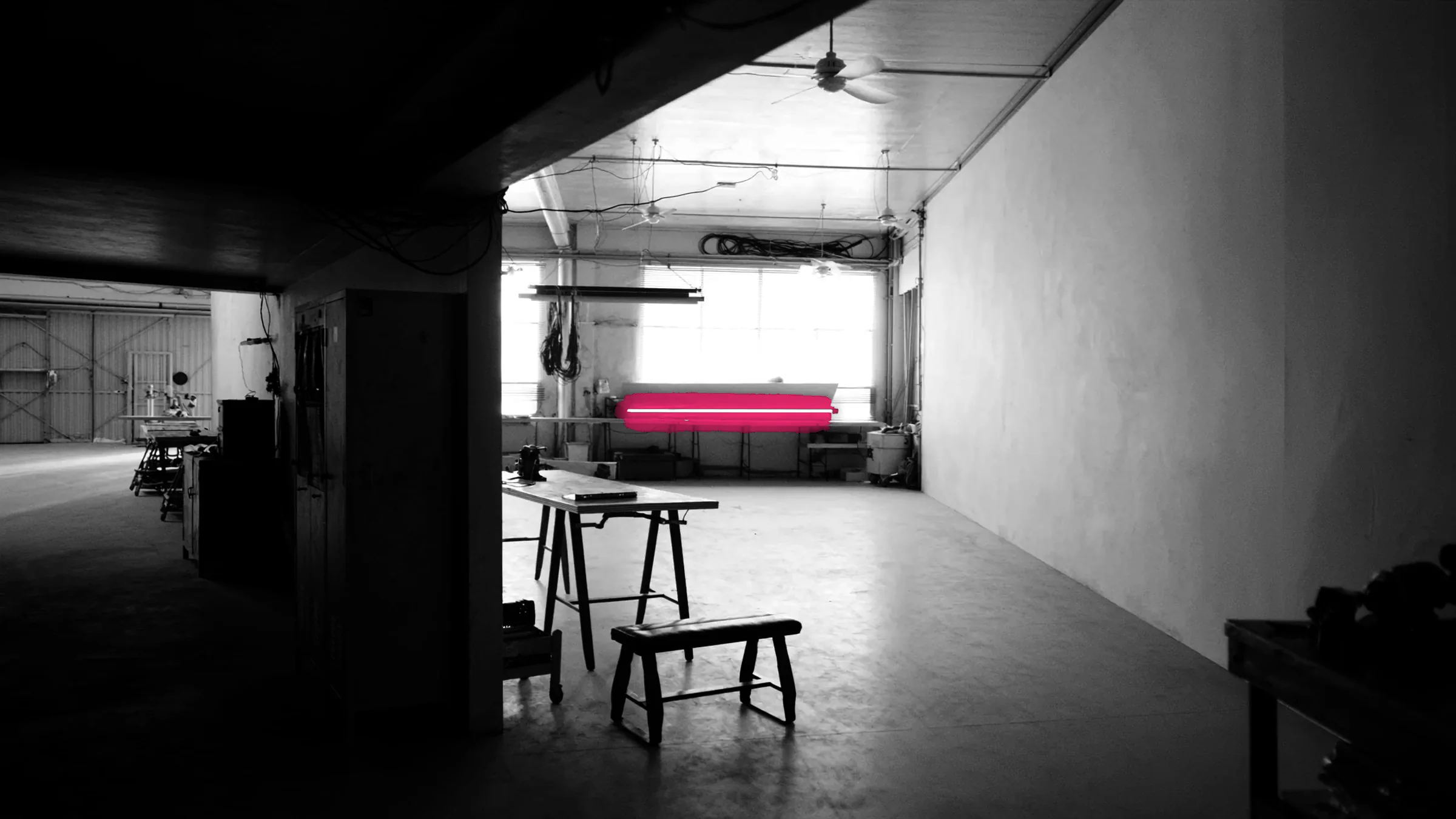 An empty workshop, lit and waiting