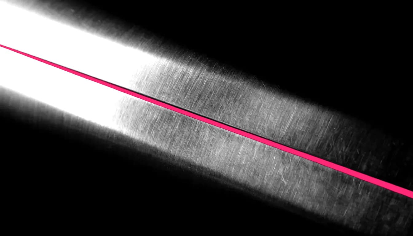 Brushed steel lit at a shallow angle